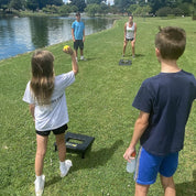 BOUNCE- Played Outdoors, Indoors, Yard, Beach, Tailgate, Park - Includes 2 Balls, Stickers and Rule Book - Great Family Game