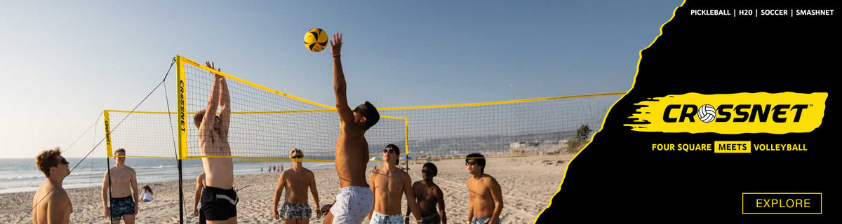 A beach volleyball scene with multiple players on a sandy court around a yellow net, alongside a large black promotional graphic on the right with the text CROSSNET, four square meets volleyball, and an explore button.
